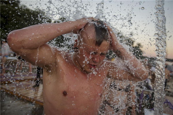 Woodstock revellers embrace music and mud