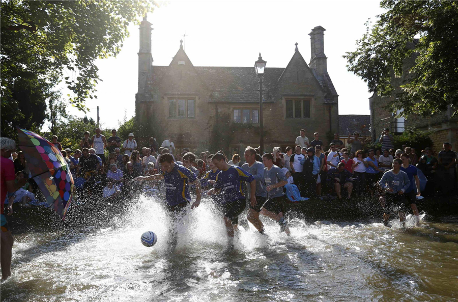 Annual river soccer match trots into village