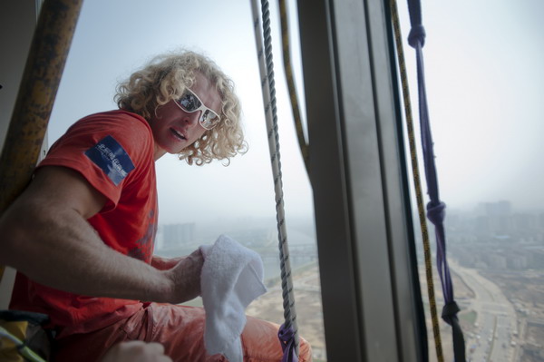 Man on the glass wall