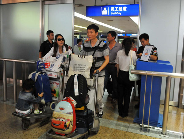 Chinese cruise liner comes back home