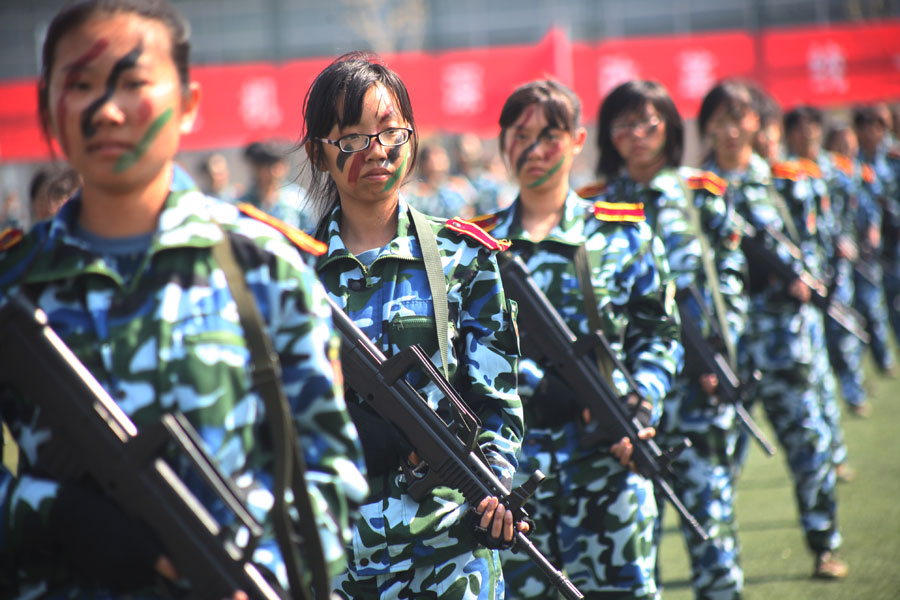 Female freshmen are unique sight in military show