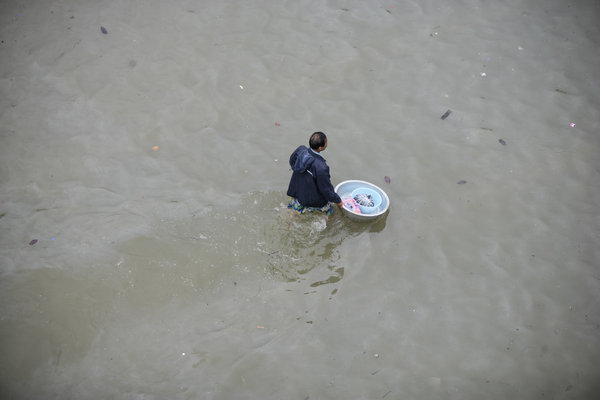 Life struggles on after devastating flood