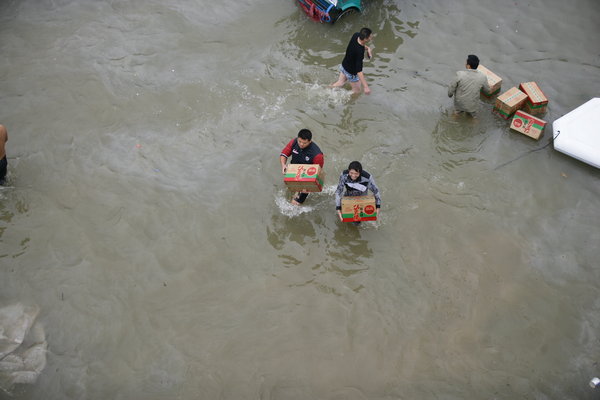 Life struggles on after devastating flood