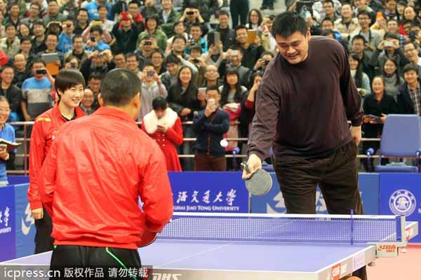 Yao Ming tries a smaller ball