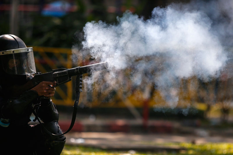 Thai police fire teargas at protesters