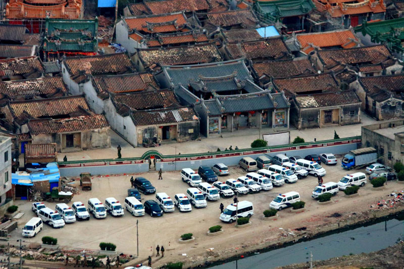 Guangdong police raid notorious drug village