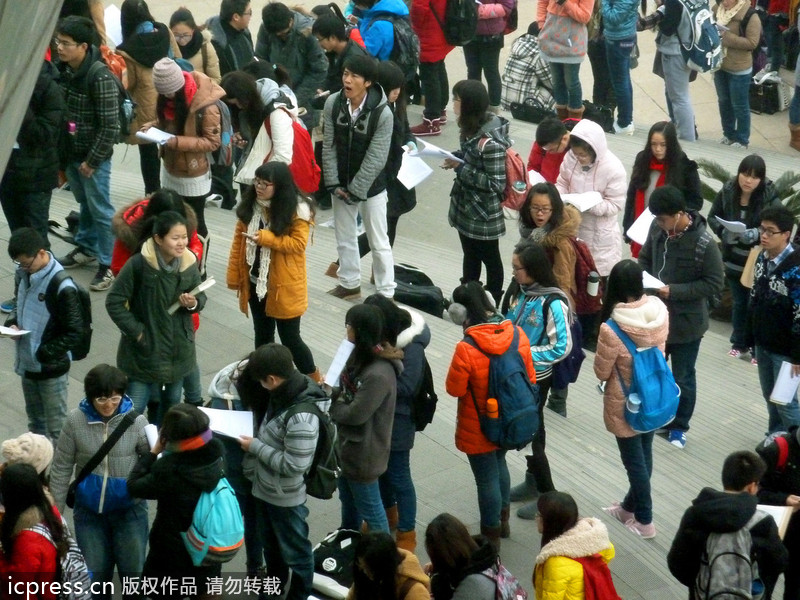 Diligent students wait for library doors to open