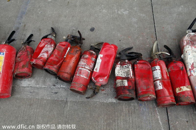 Tank flattens phony fire fighting gear