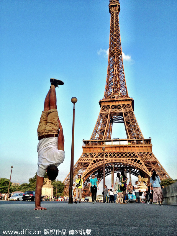 Breakdancer 'freezes' in front of Paris landmark