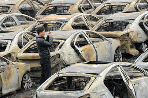 Fire on barbecue bus raises alarm in Beijing