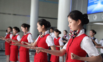 Angels descend from air to catwalk