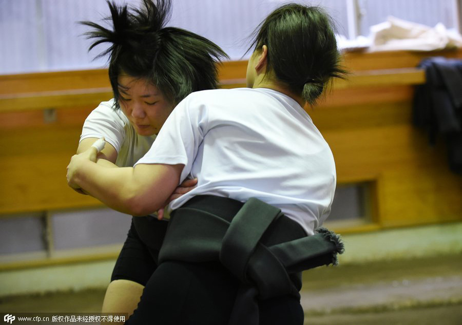 Japan's women wrestlers take on sumo's big boys