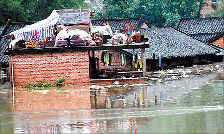 57 killed as rain, floods lash south