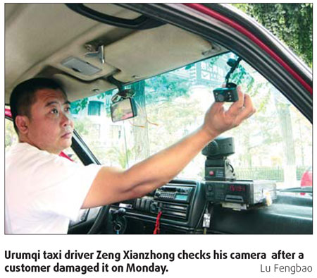 Taxi camera offends woman passenger