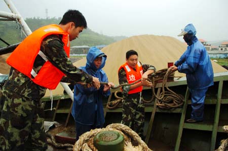 China issues orange alert for typhoon Jangmi