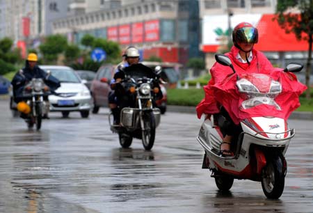 China issues orange alert for typhoon Jangmi