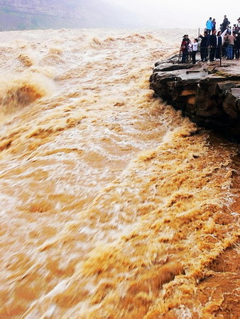 Rain Unleashes Hukou Waterfall