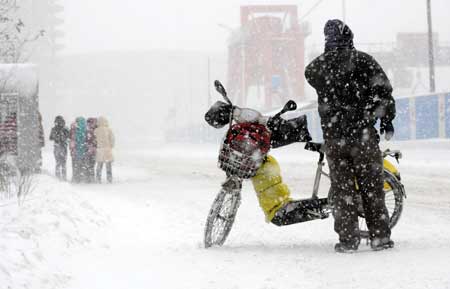 Snow, freezing cold bring disruption to north China