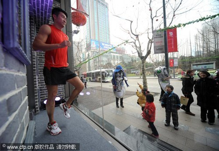 Model jogges in window to promte a healthy workout