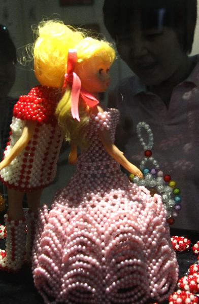 Intangible cultural heritage exhibition opens in Beijing prior to Children's Day