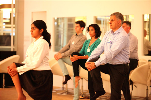 Davos Forum participants get a taste of Tai Chi