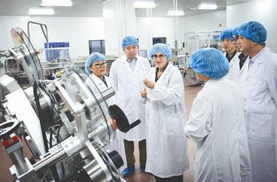 WHO officials visit Chinese biomedicine producer