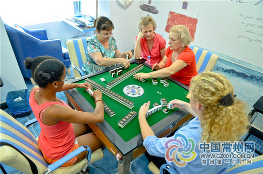 Foreigners, locals play mahjong in Changzhou