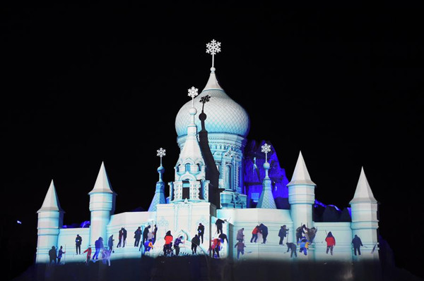 3D snow-light show held at Sun Island Int'l Snow Sculpture Art Expo