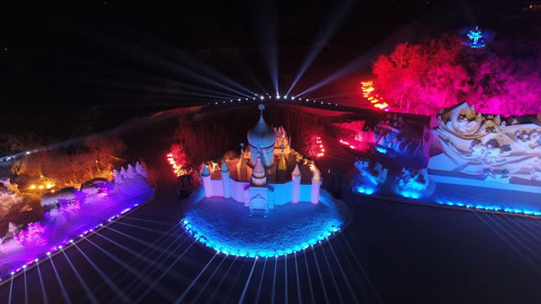 3D snow-light show held at Sun Island Int'l Snow Sculpture Art Expo