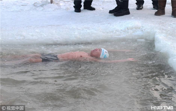 Winter swimmers enjoy frozen New Year’s Day