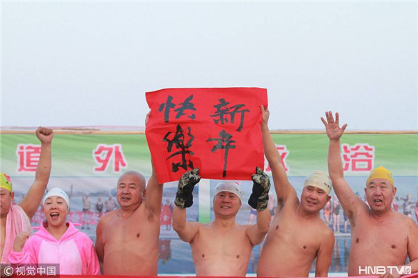 Winter swimmers enjoy frozen New Year’s Day