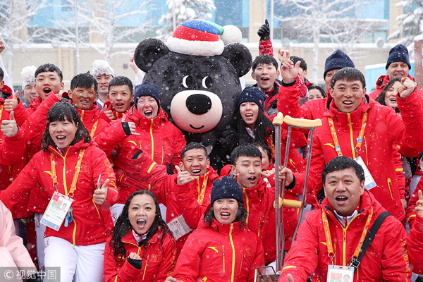 Chinese Paralympic athletes welcomed at Olympic Village in Pyeongchang