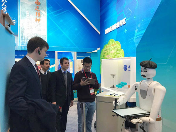 Foreign diplomats, scholars visit reform and opening-up exhibit in Beijing