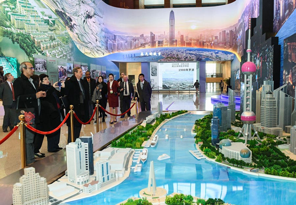 Foreign diplomats, scholars visit reform and opening-up exhibit in Beijing