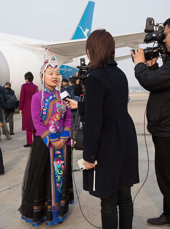 Deputies to 13th NPC arrive in Beijing