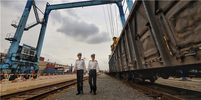 Customs officials inspect transportation site