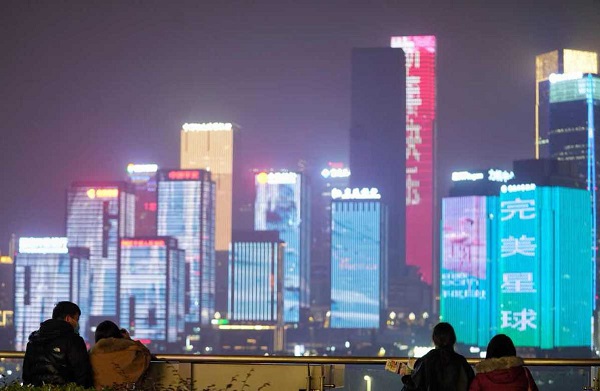 TV trailer plays across Chongqing skyscrapers