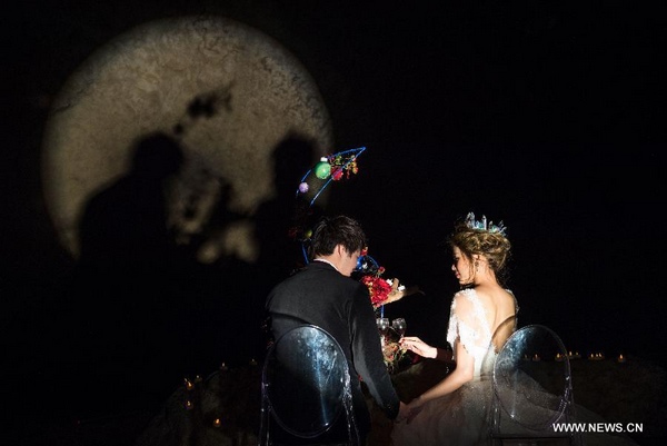 Couple hold wedding ceremony at karst cave