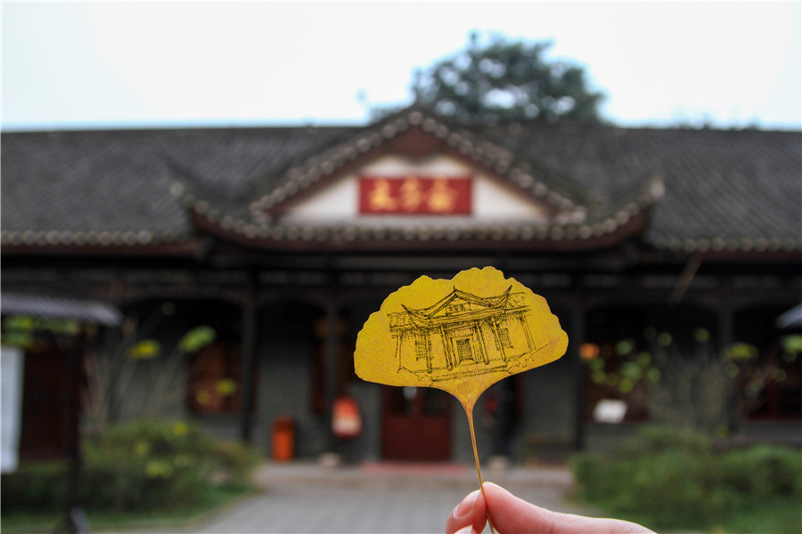 Students make artwork with leaves