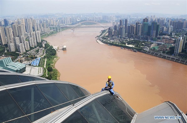 People work in heatwave in China's Chongqing