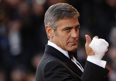 George Clooney and his girlfriend on red carpet at 66th Venice Film Festival