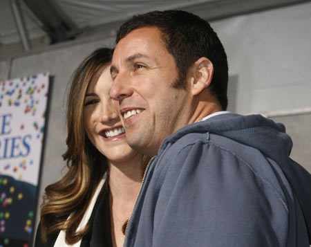 Adam Sandler poses with wife