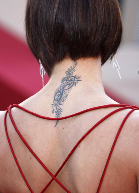 Special Coverage:62nd Cannes Film Festival. A tattoo is seen on the neck of 