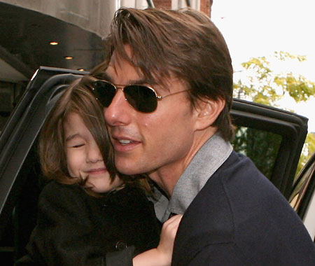 Tom, Katie & Suri leaving the theatre in Melbourne