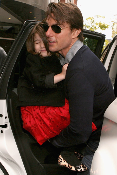 Tom, Katie & Suri leaving the theatre in Melbourne