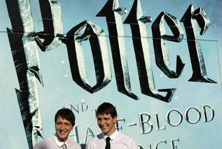 Actors James and Oliver Phelps pose on 