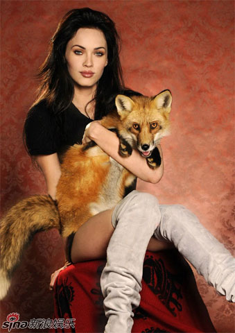 Megan Fox poses with animals