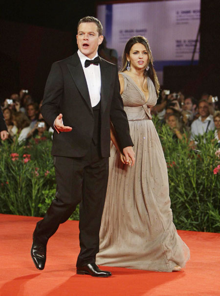 Matt Damon and his wife walk on the red carpet at the 66th Venice Film Festival