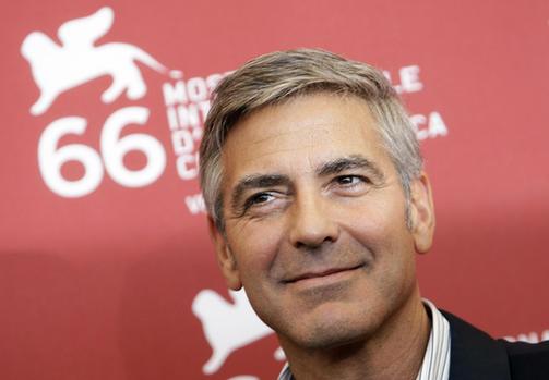 George Clooney attends the photocall at Venice