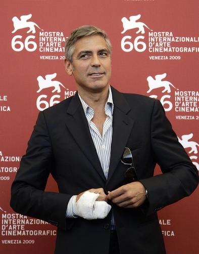 George Clooney attends the photocall at Venice